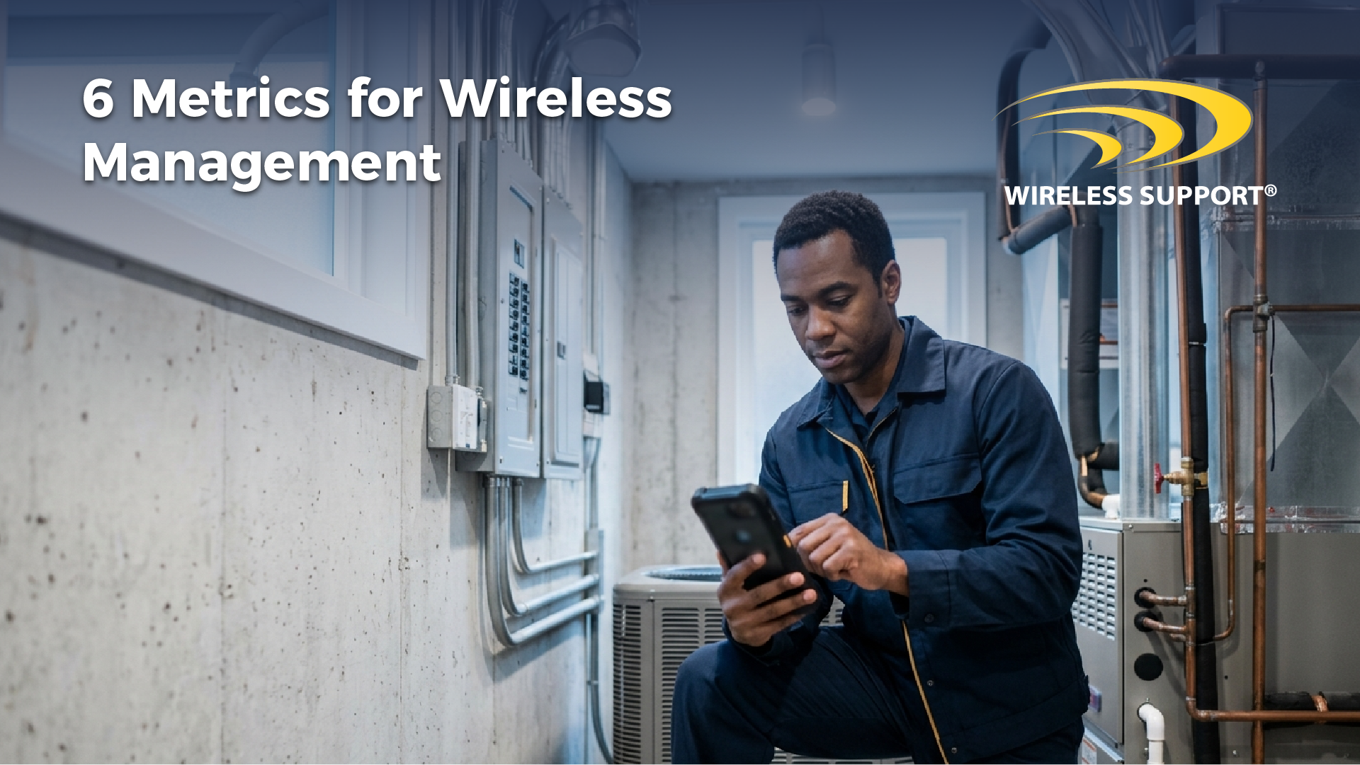 home services tech using his phone in front of an electric panel