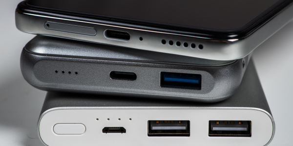 a stack of old unused smartphones